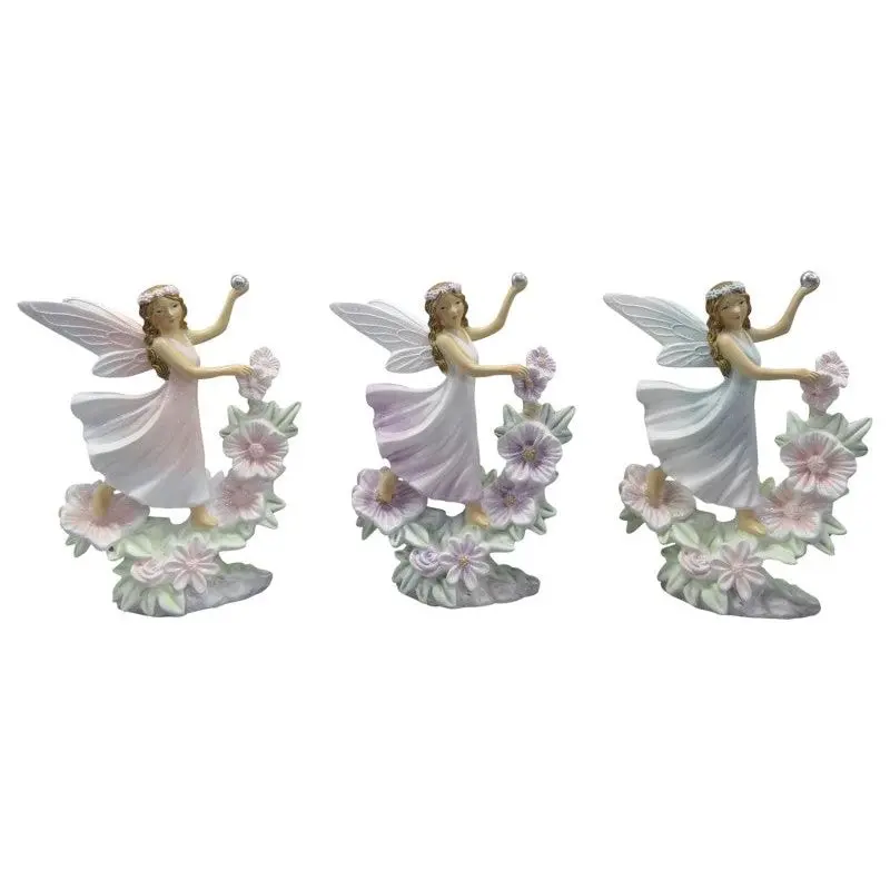 Fairy on Flowers Holding Ball - Home & Garden